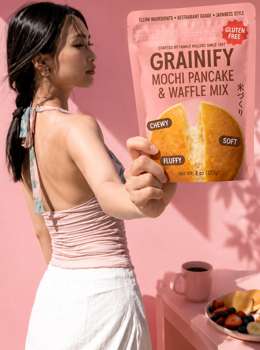 Woman holding a pouch of Grainify gluten-free mochi pancake & waffle mix